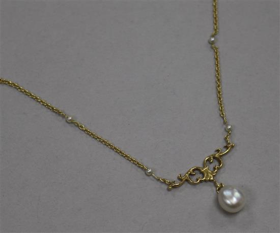 An 18ct gold and cultured? pearl drop necklace, the chain set with seed pearls, 62cm.